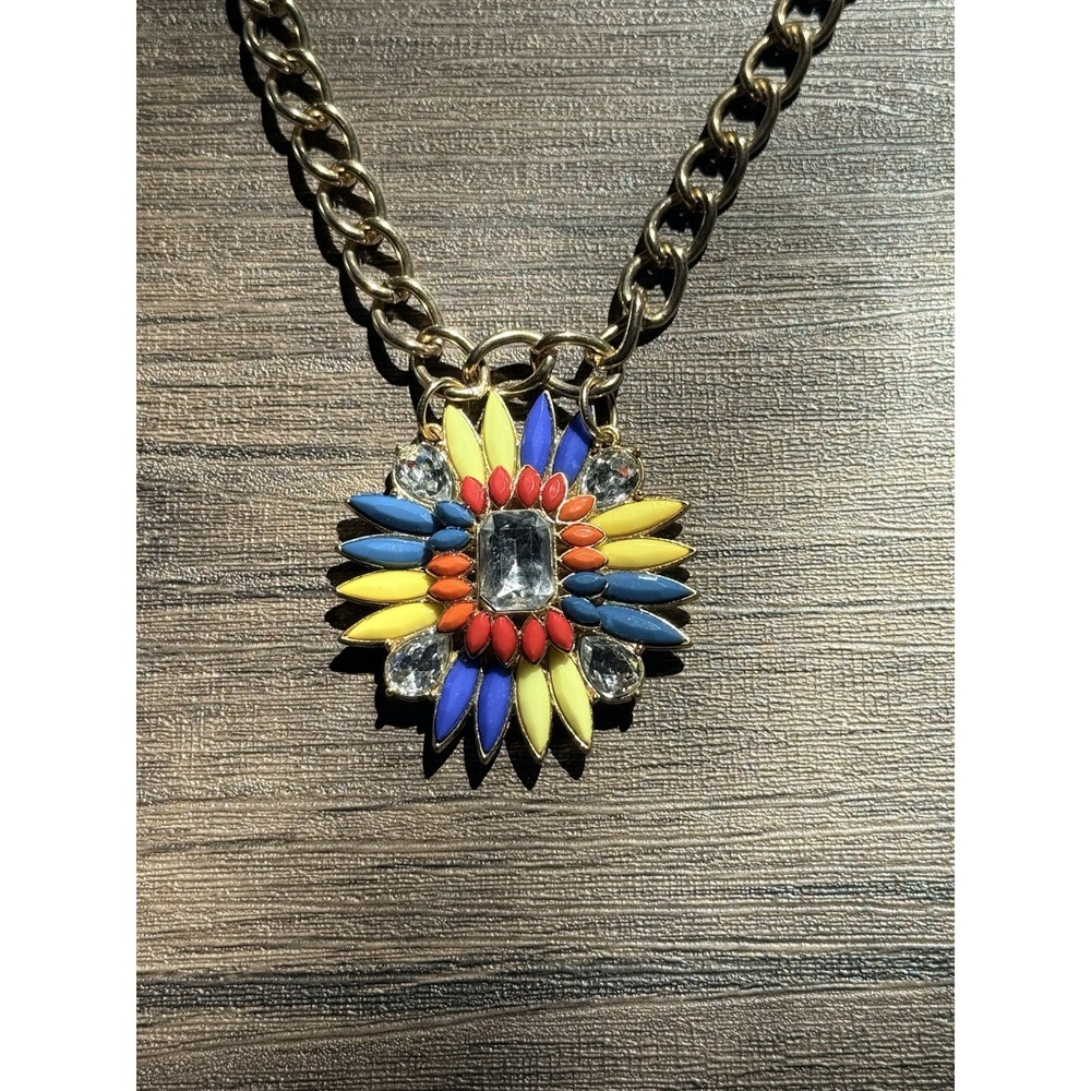 Multi coloured sunburst necklace with gold and black rope chain